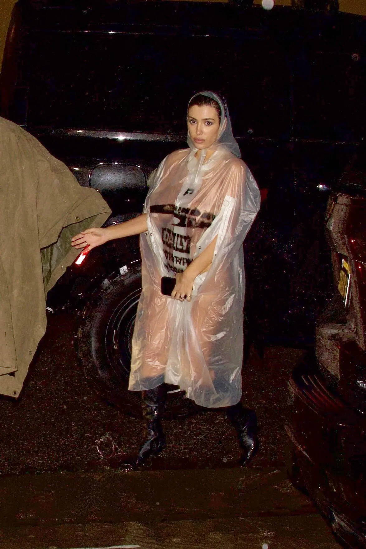 Bianca Censori Puts Everything On Display In A Clear See-Through Raincoat While Out With Kanye West.