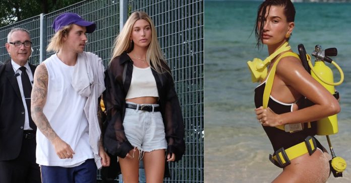 Hailey Bieber Shows Off Her Stunning Figure In Swimsuit And Poses With Yellow Scuba Gear.