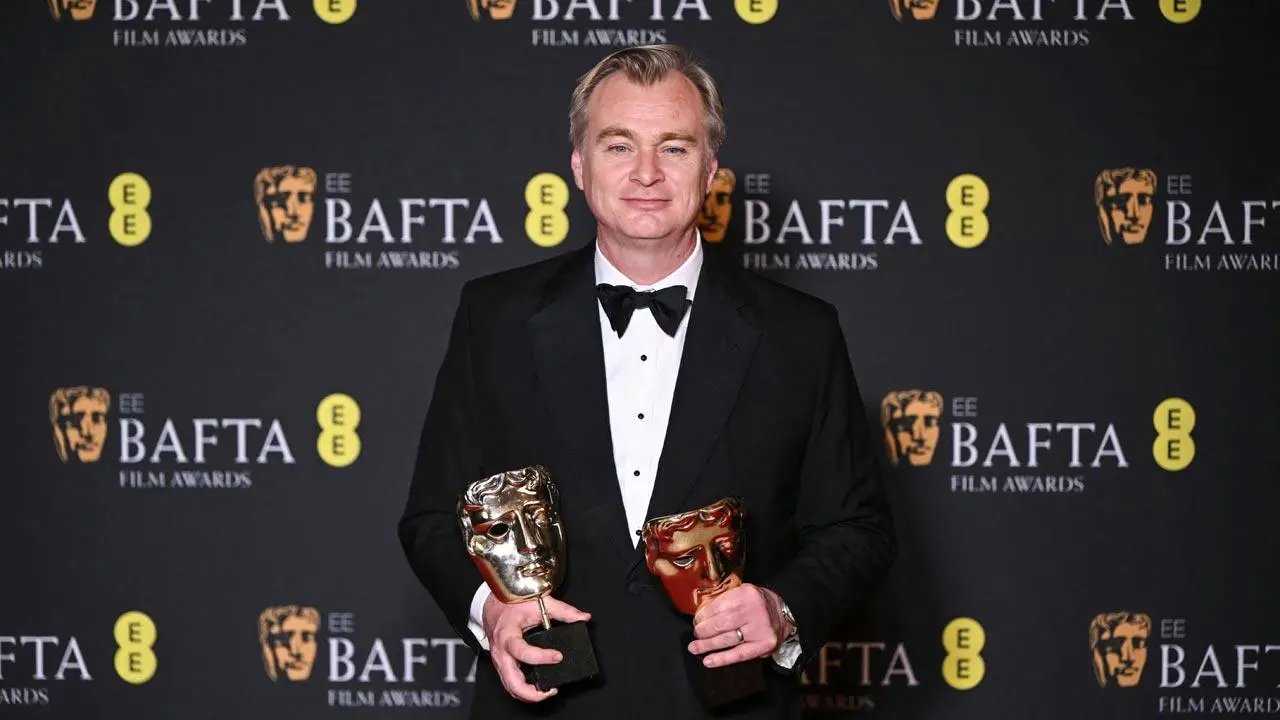 Christopher Nolan, winner of the awards for Director and Best Film for Oppenheimer.