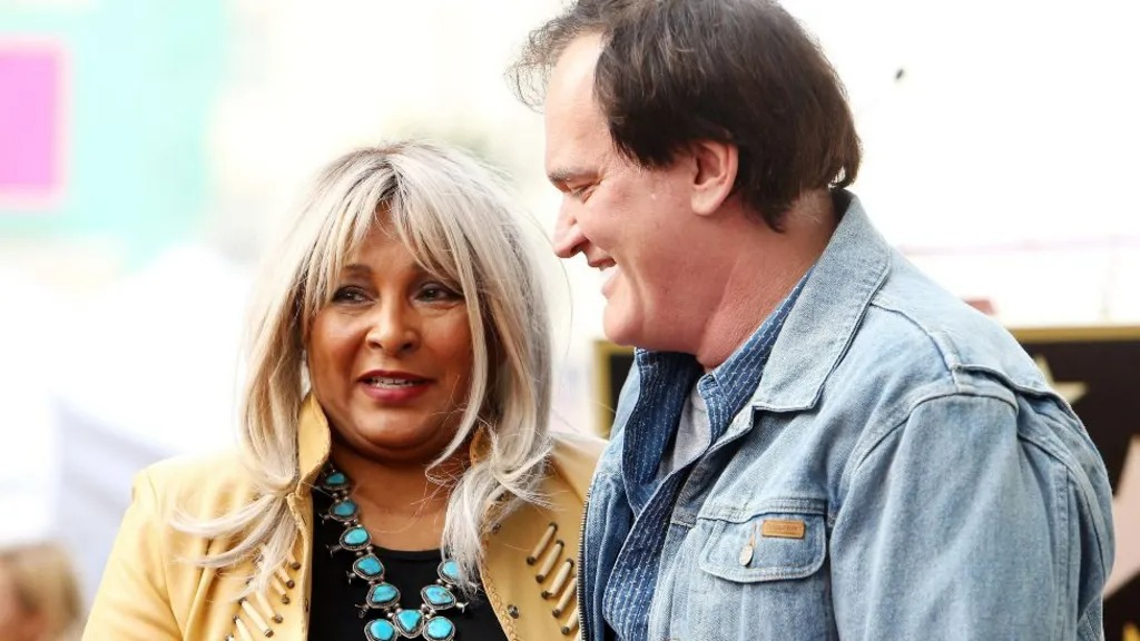 Pam Grier, who starred in Jackie Brown, joined Tarantino when he got his star on the Hollywood Walk of Fame