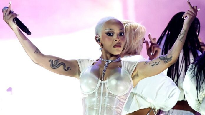 Doja Cat Performs Provocatively At Coachella With Mud Dancing, Dinosaurs And Yetis